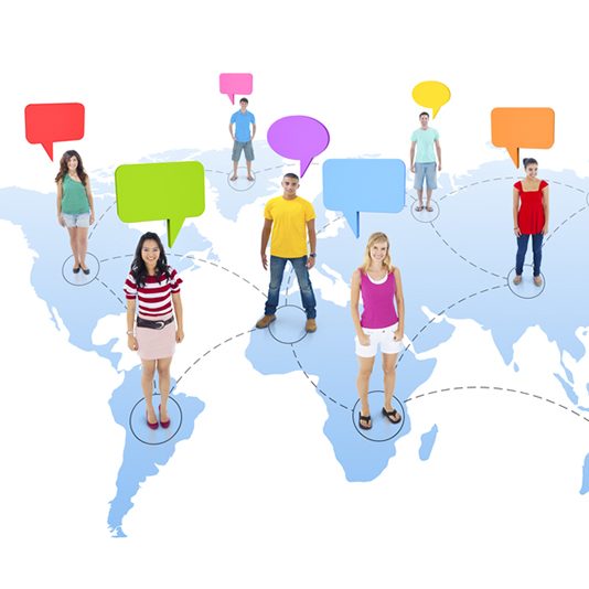 Global Communications graphic with different people standing on a map of the world